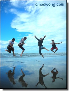 Jumping With Joy on The Beach