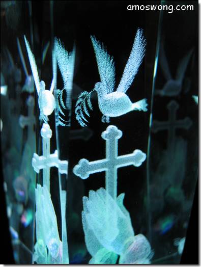 Laser Glass Macro of Dove, Fig Leave, praying hands and cross