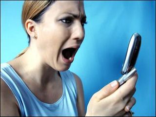 Shocked Lady at Mobile Phone Shocked Lady at Mobile Phone